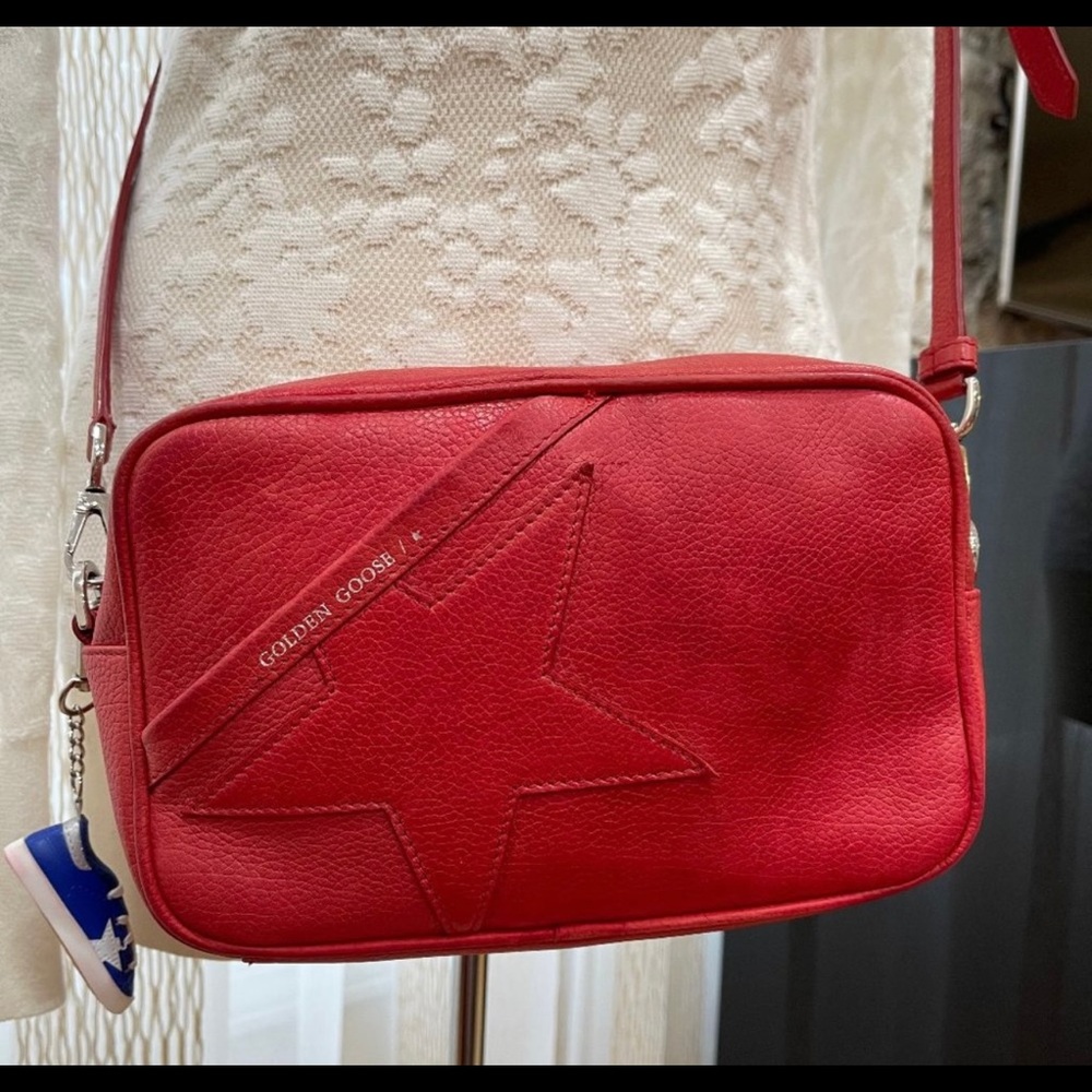 Golden goose cross body red leather bag.